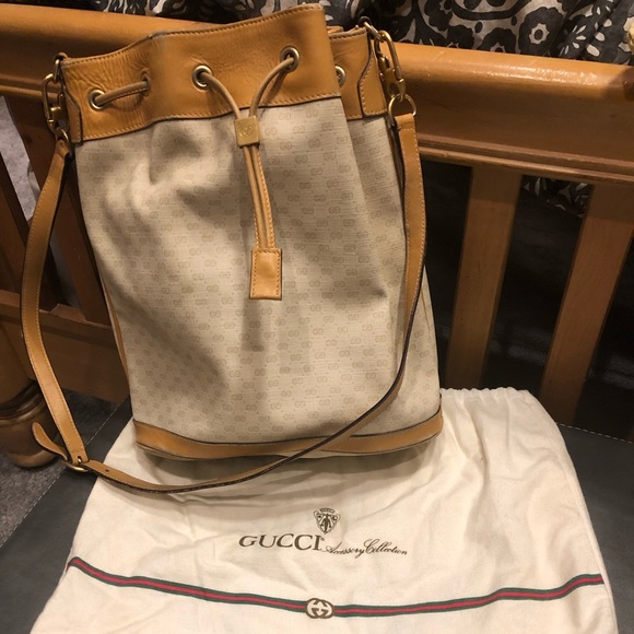 Gucci Handbags - GUCCI Beige w/Tan Bucket Vintage Bag!!